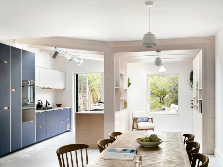 Framework House dining and kitchen space by Amos Goldreich Architecture
