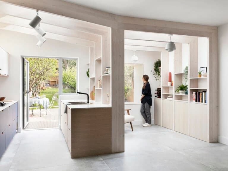 Framework House kitchen and living area by Amos Goldreich Architecture