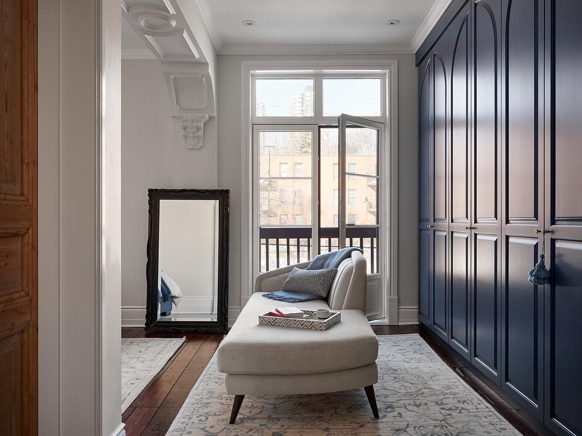Chic room corner blending light, comfort, and classic design elements for a serene retreat.