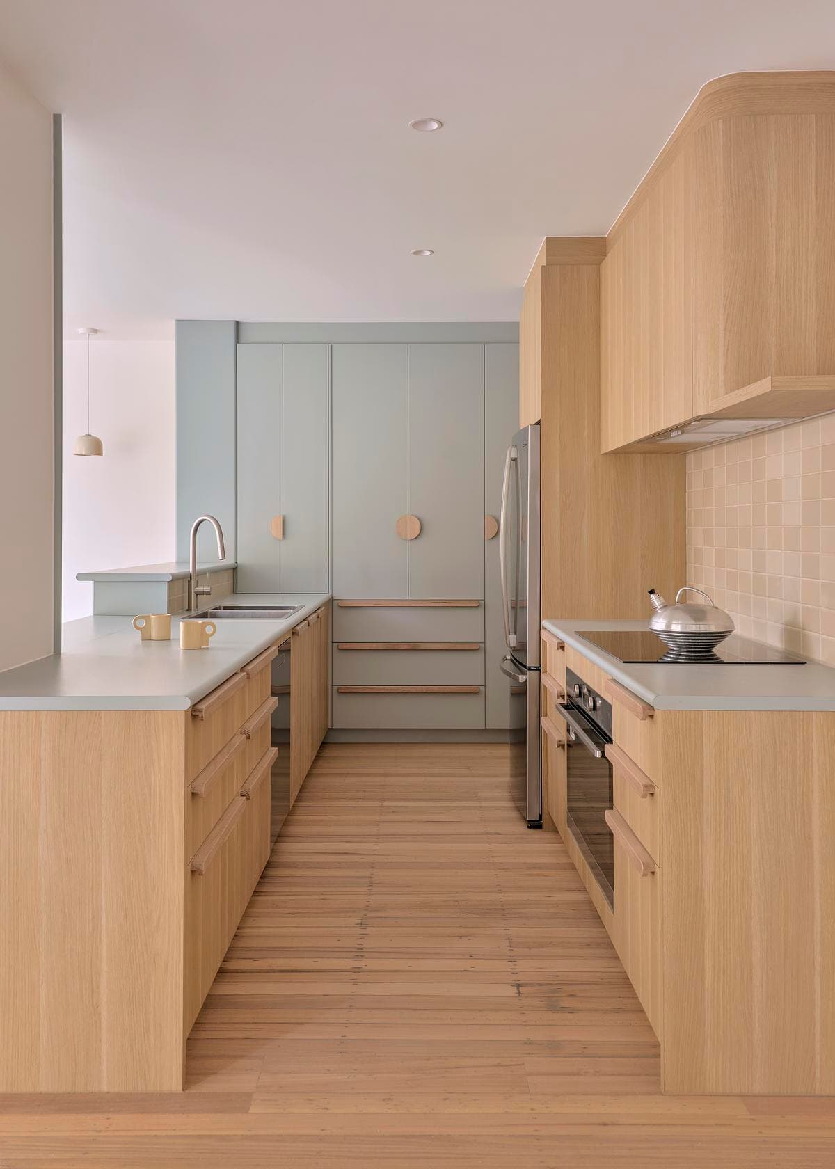 Kitchen cabinetry and worktops within the adapted house