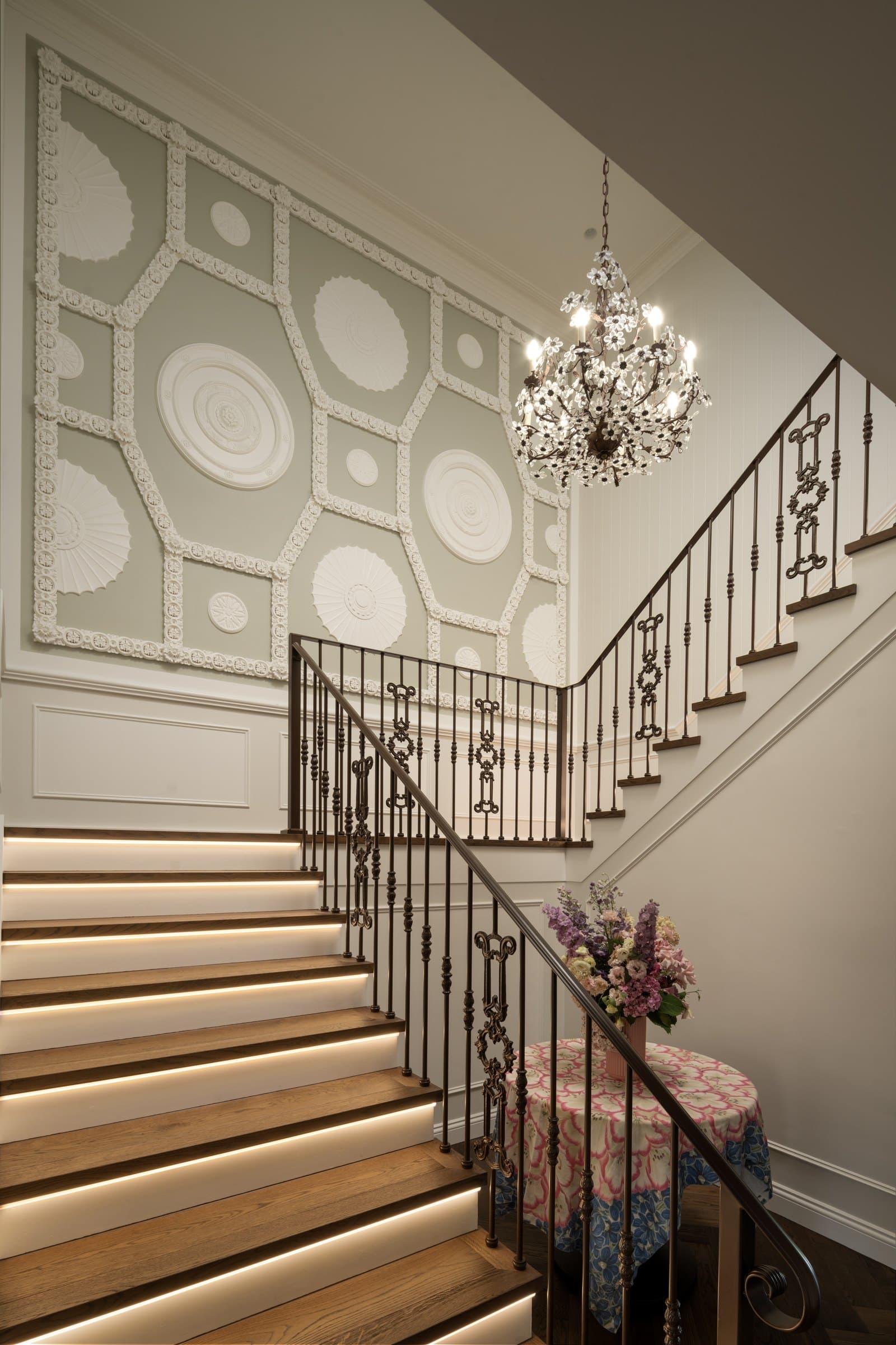 Benedictus Residence: staircase, wall panels and chandelier