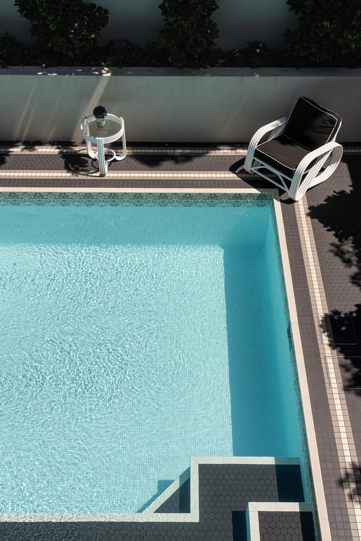 Benedictus Residence: pool edge and outdoor seating