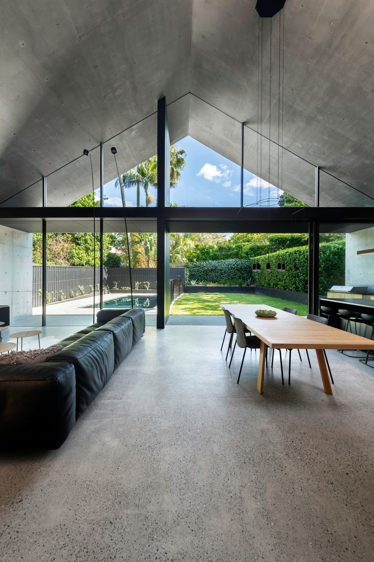 Double-height living space facing the garden