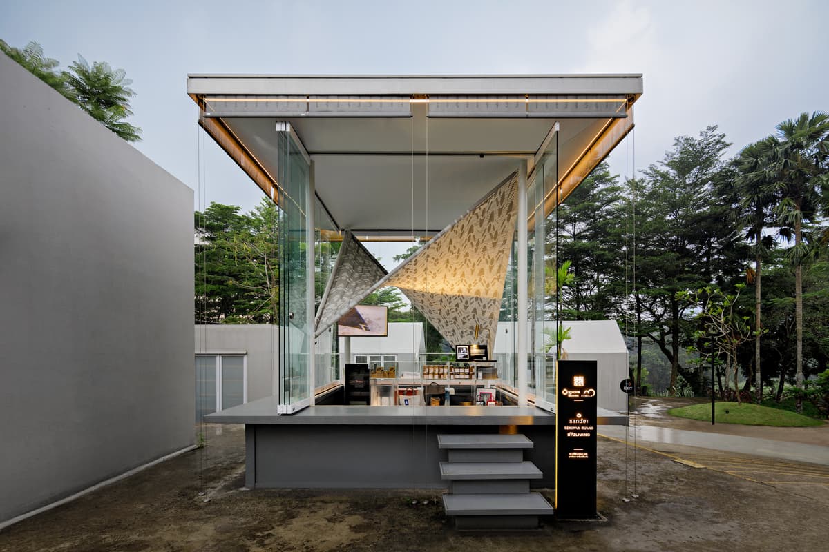 A frontal view reveals the woven installation above the retail display.