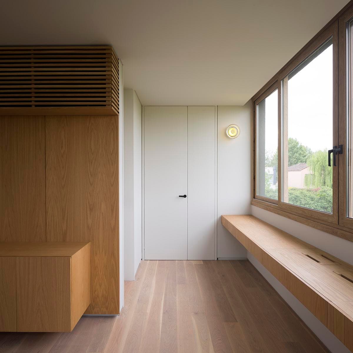 Timber window seat and opening beside the kitchen