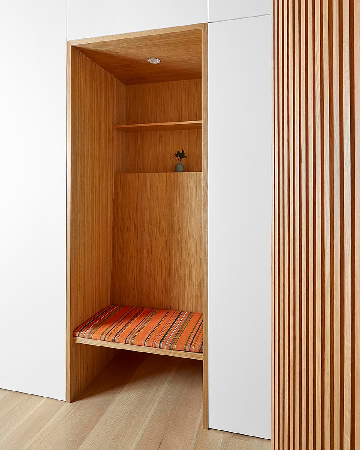 Ribbed sliding doors create a changeable threshold between rooms.