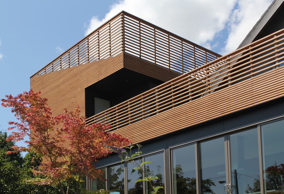 Cedar screening around the upper terrace and roofline