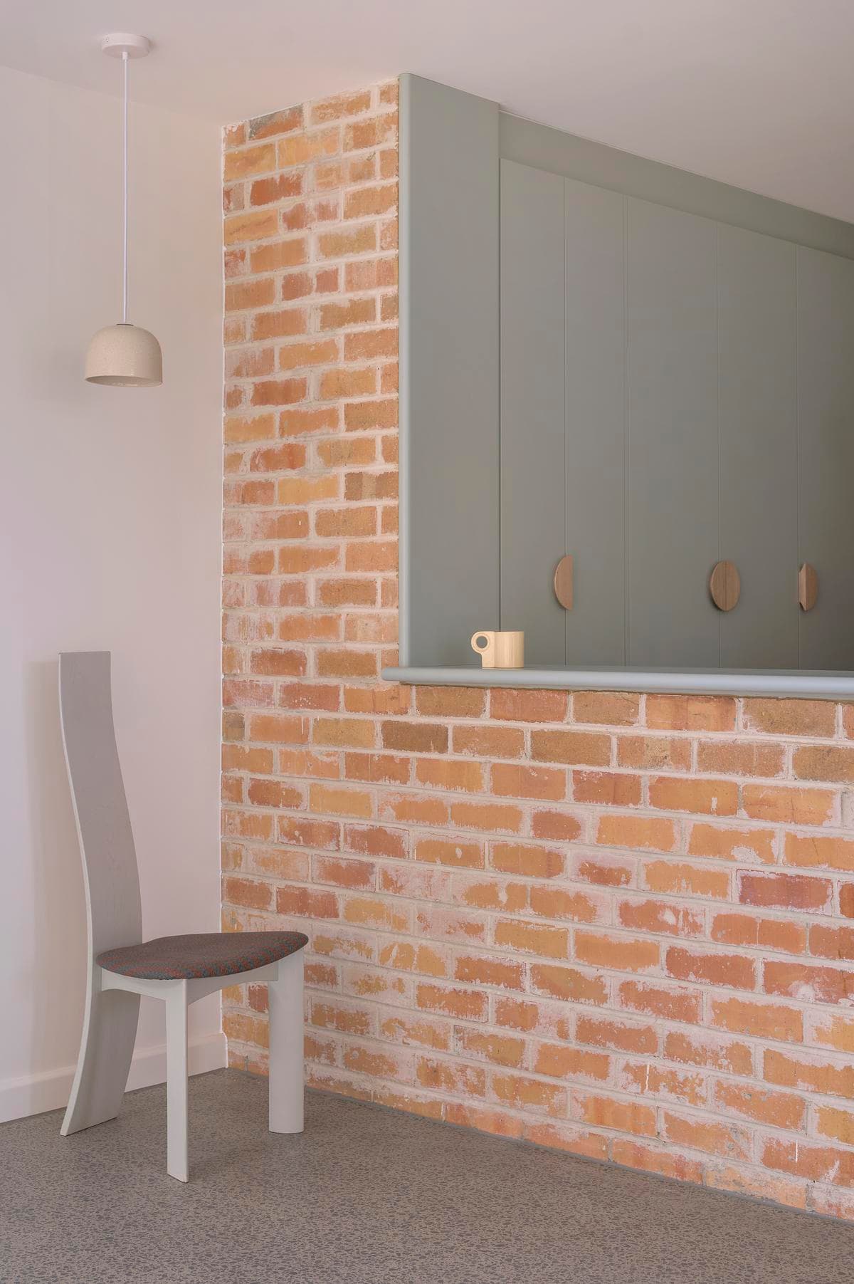 Retained brickwork beside the kitchen and entrance