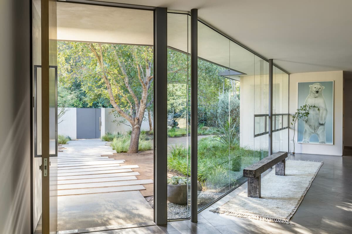 The entrance hallway opening to garden views