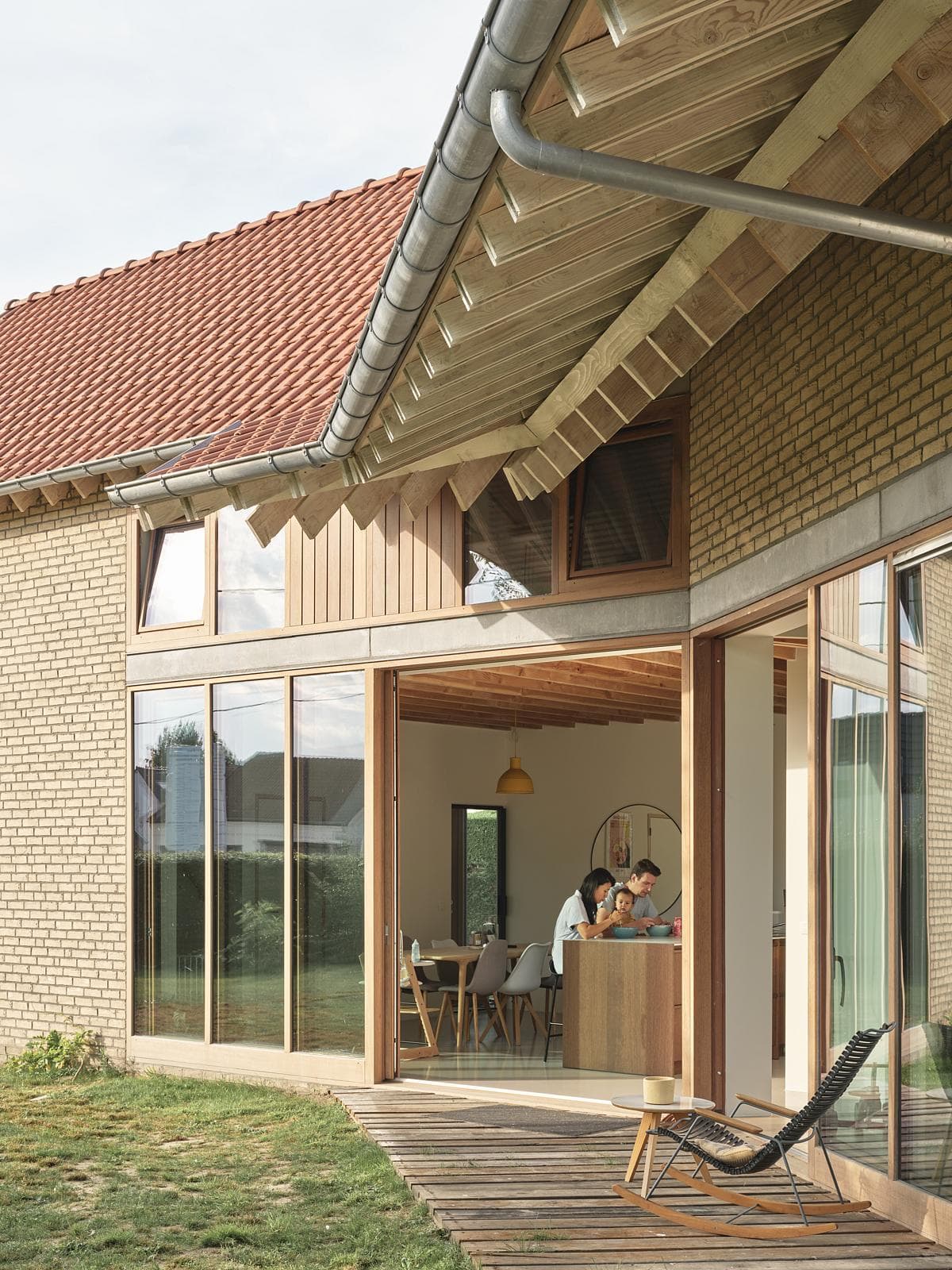 Sheltered terrace beneath the projecting timber rafters