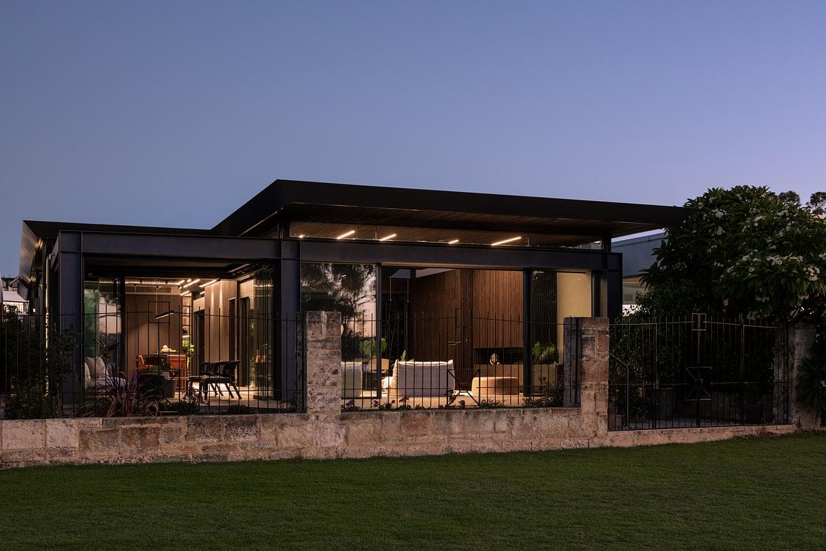 Covered outdoor living space at dusk