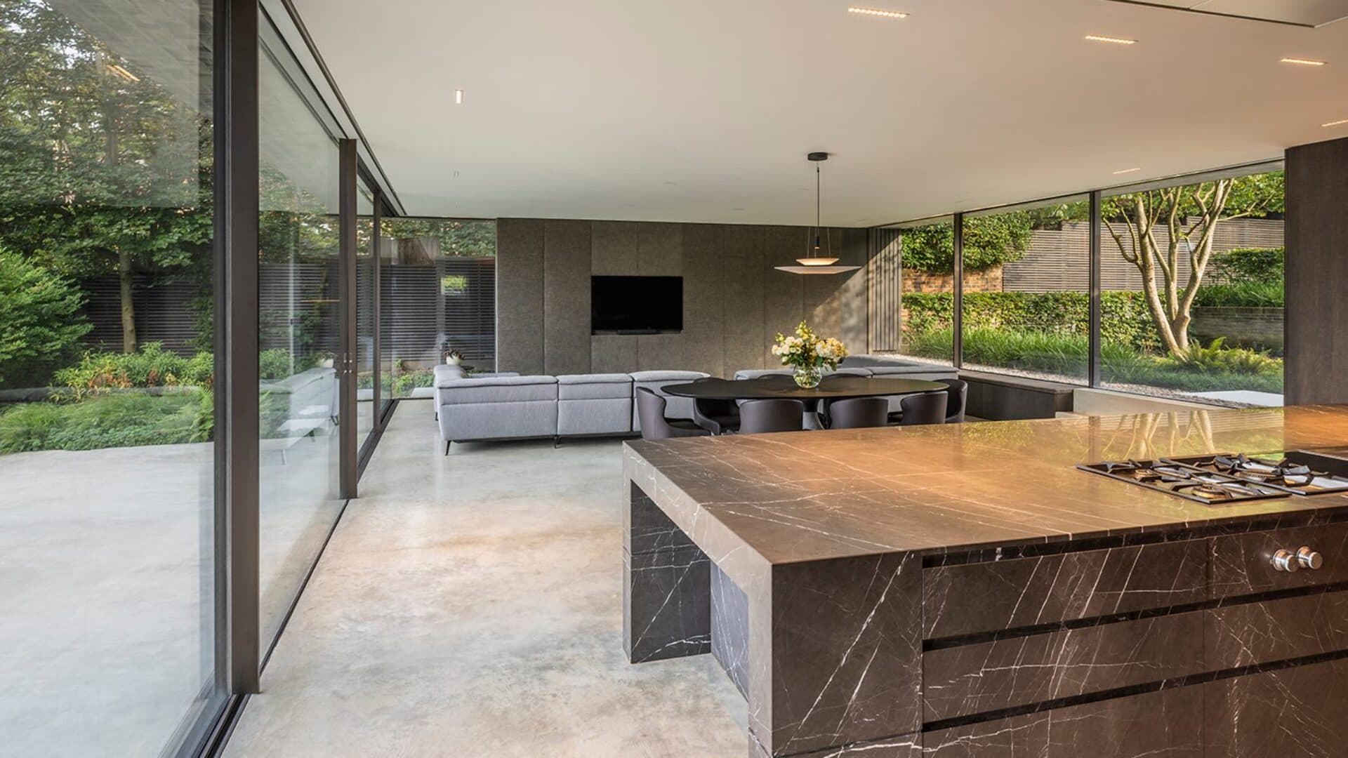 The kitchen opens towards planting and the garden