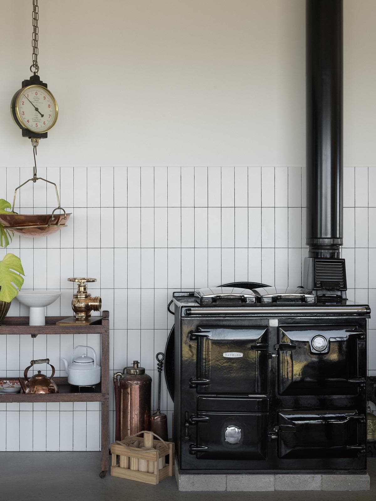 A stove and tiled wall inside Carrickalinga Shed