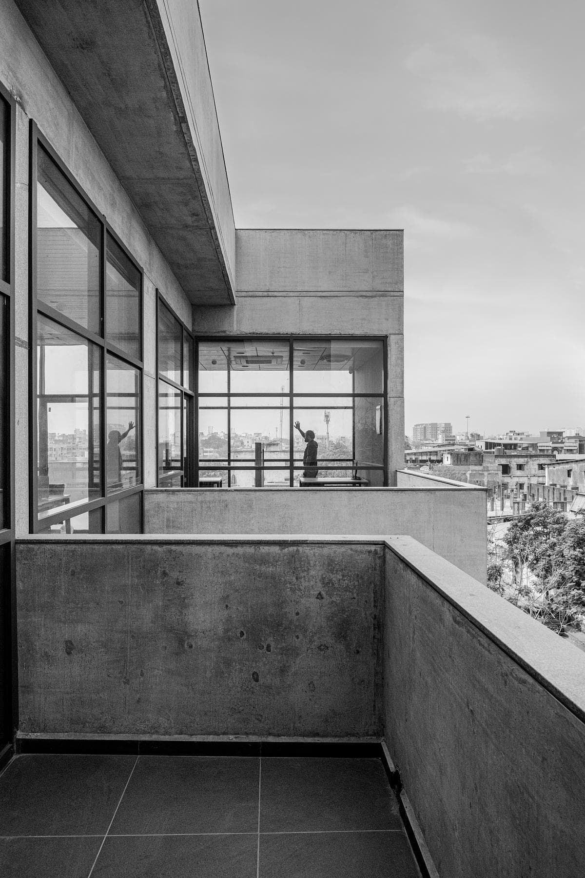Terrace passage beside the bank’s upper-level glazing