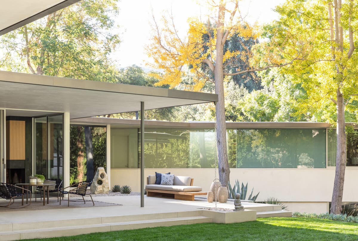 A sheltered garden terrace beside the pool