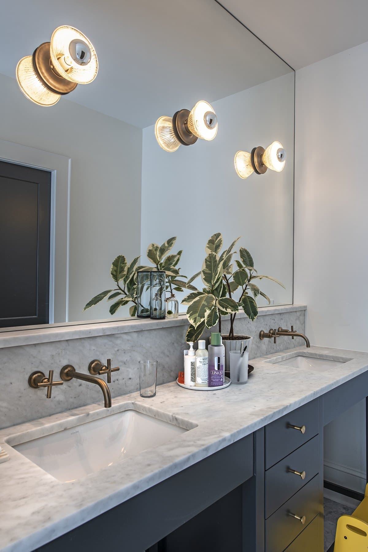 Ormewood Park Residence: bathroom vanity with wall-mounted taps