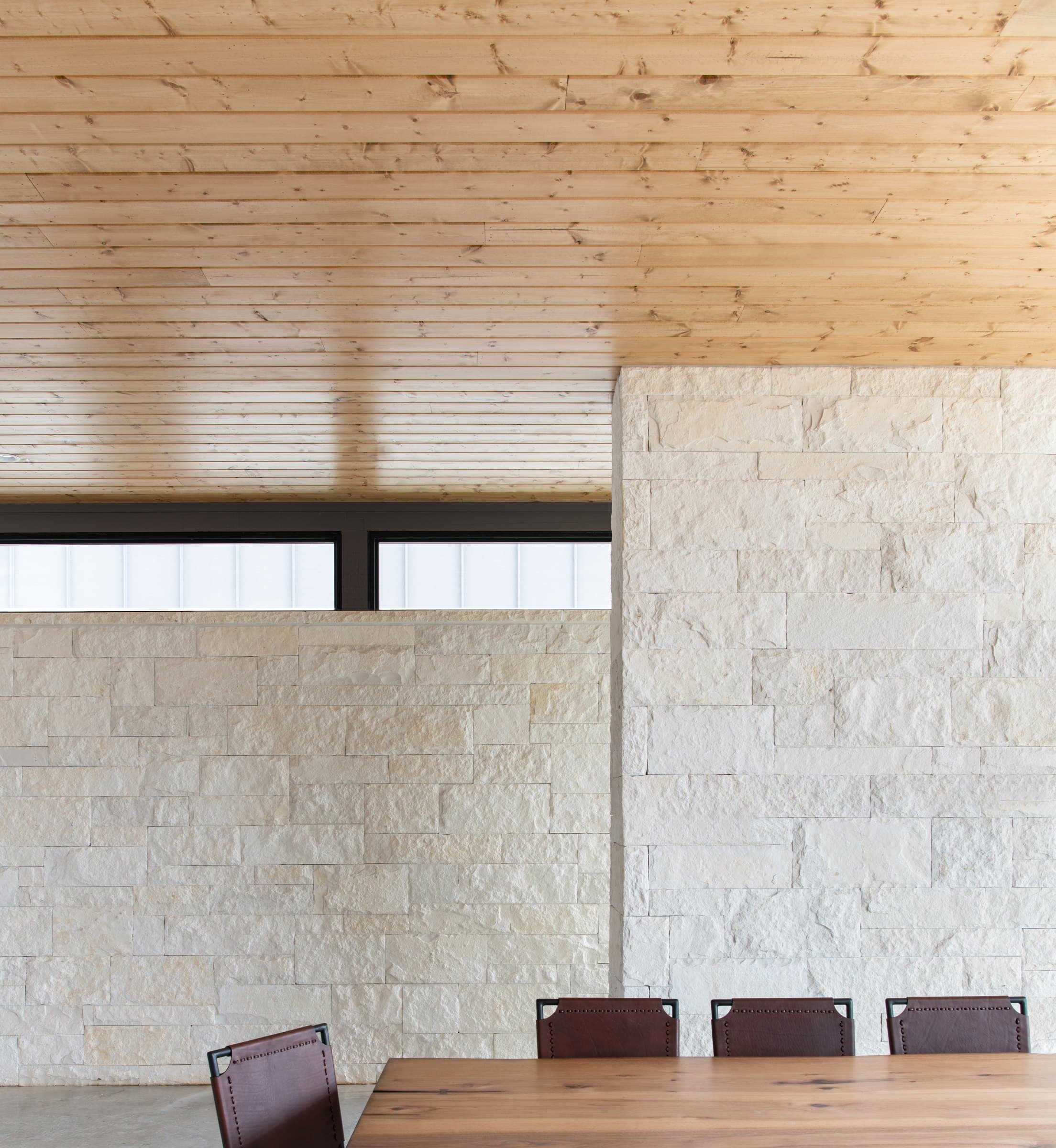 Timber ceiling and high-level light above the dining area