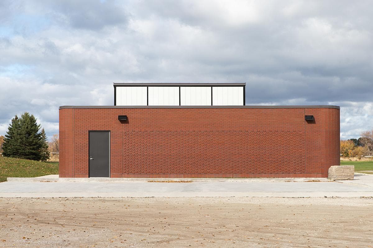 The low brick enclosure beneath the central roof light.