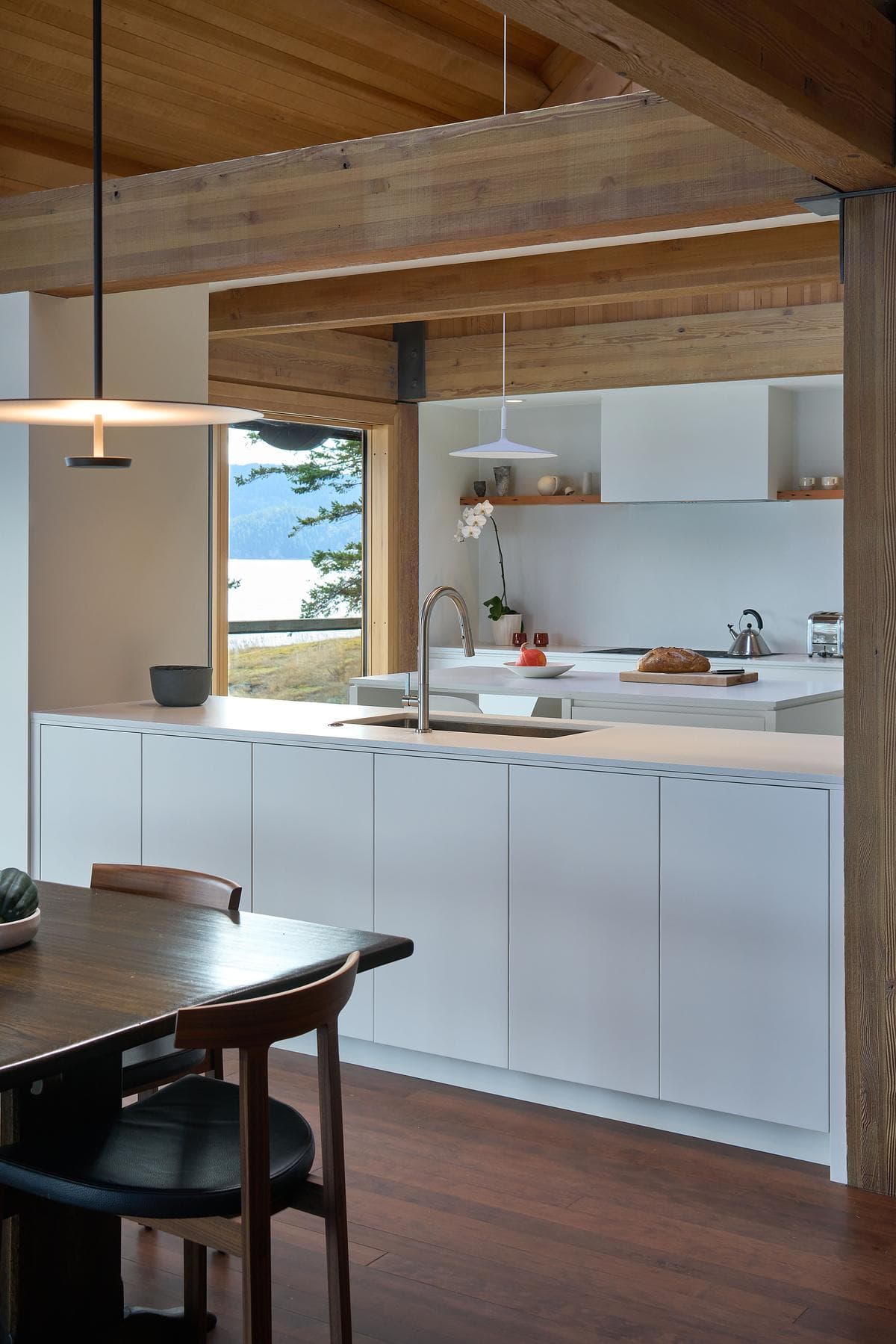 New kitchen beneath the cabin’s timber roof