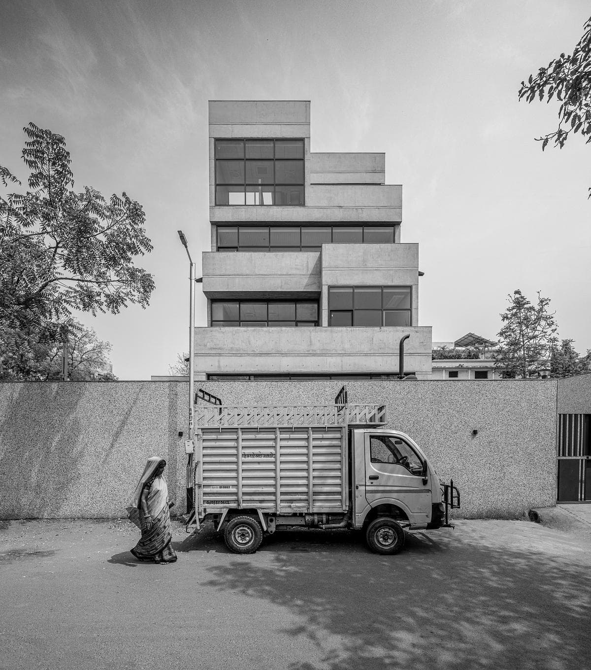 Street elevation and entrance to Surat National Bank
