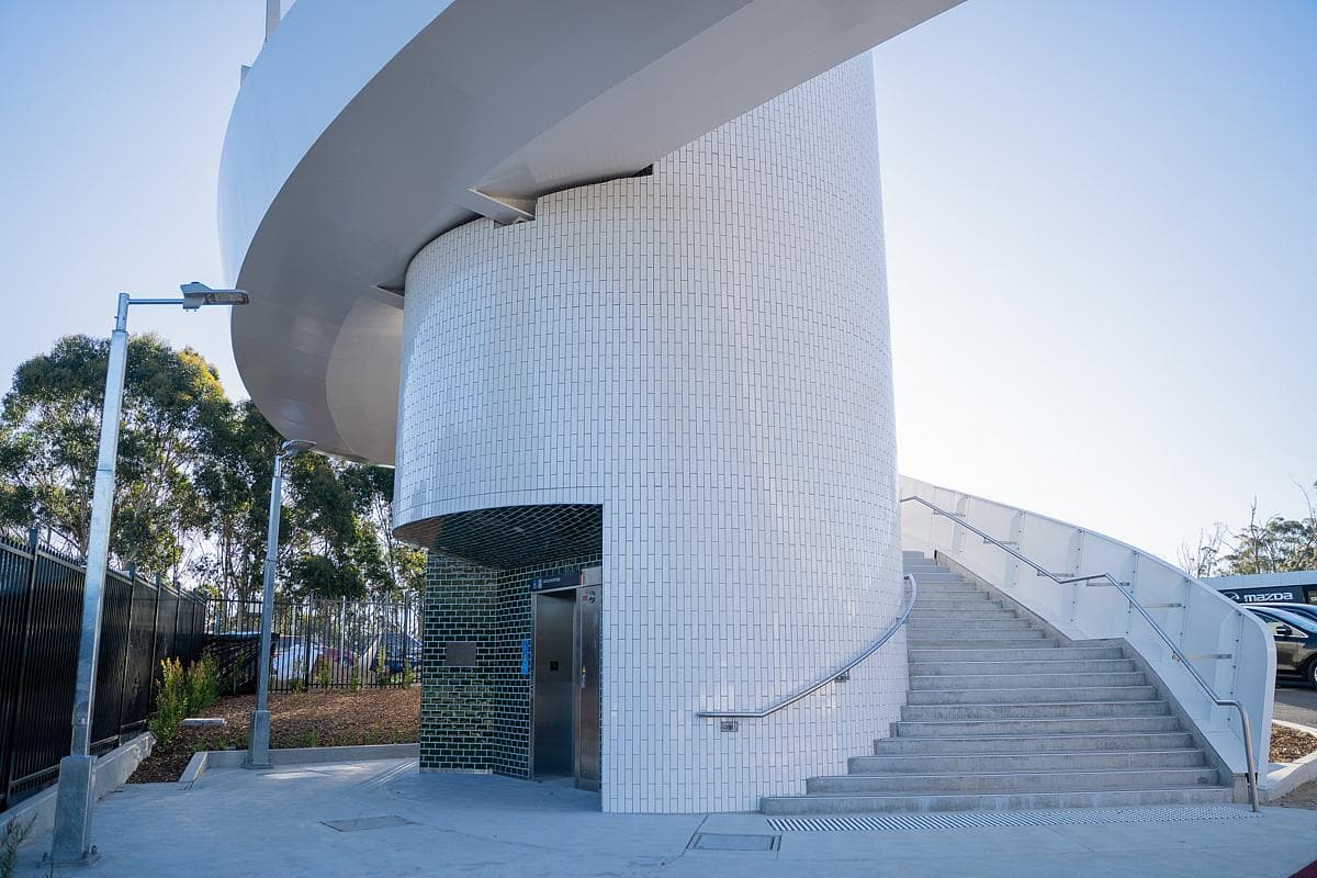 The lift tower and stair at the foot of the bridge.