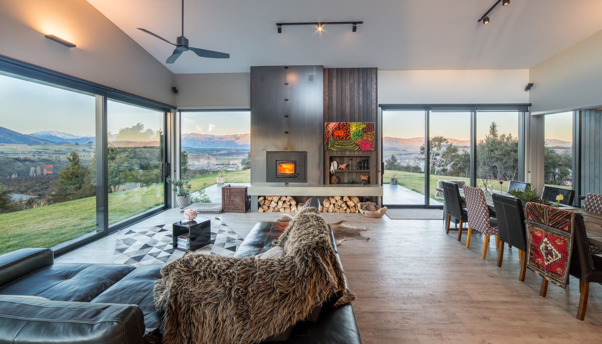 Living and dining spaces frame views on both sides