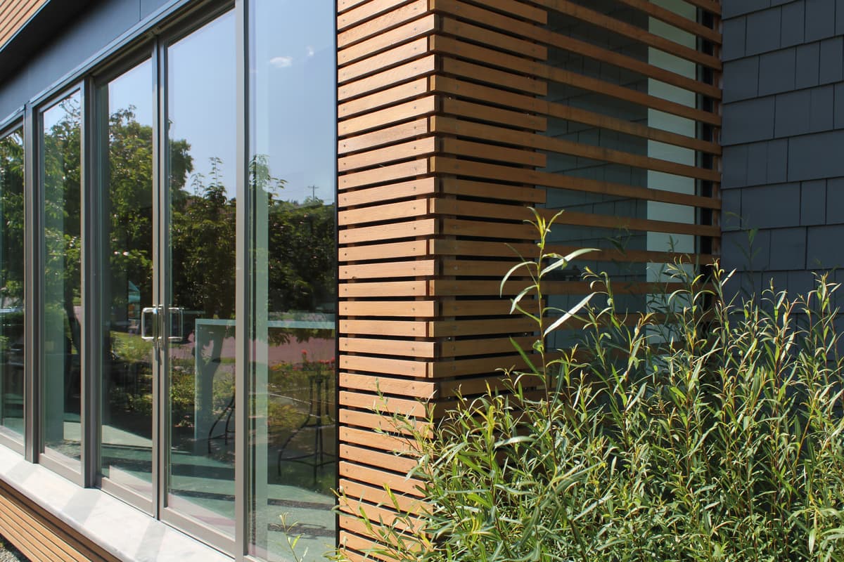 Operable glazed wall opening the great room to the garden