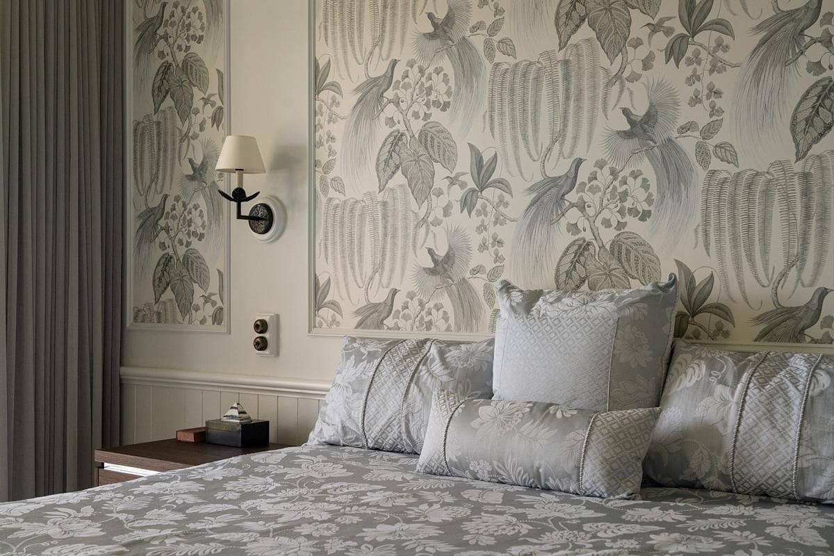 Benedictus Residence: bedroom with patterned walls and joinery