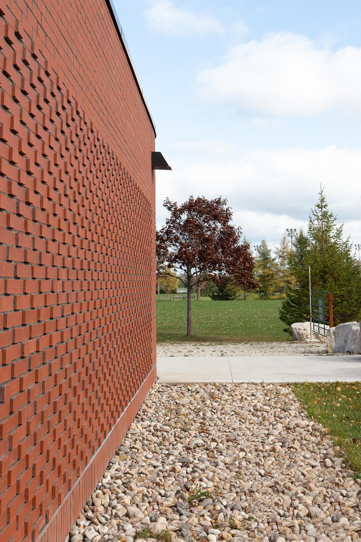 Textured brickwork at the edge of the pavilion.