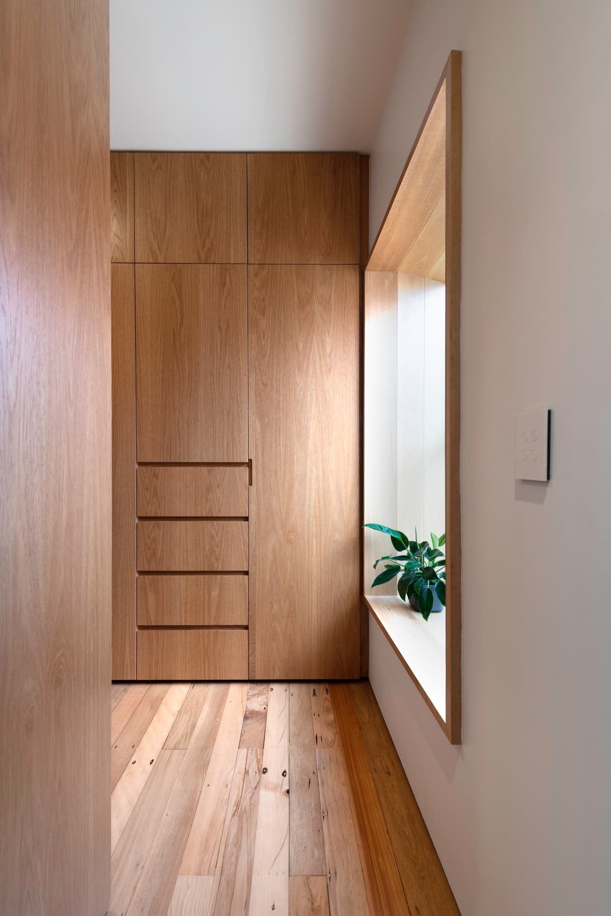 Timber-lined stair and fitted joinery