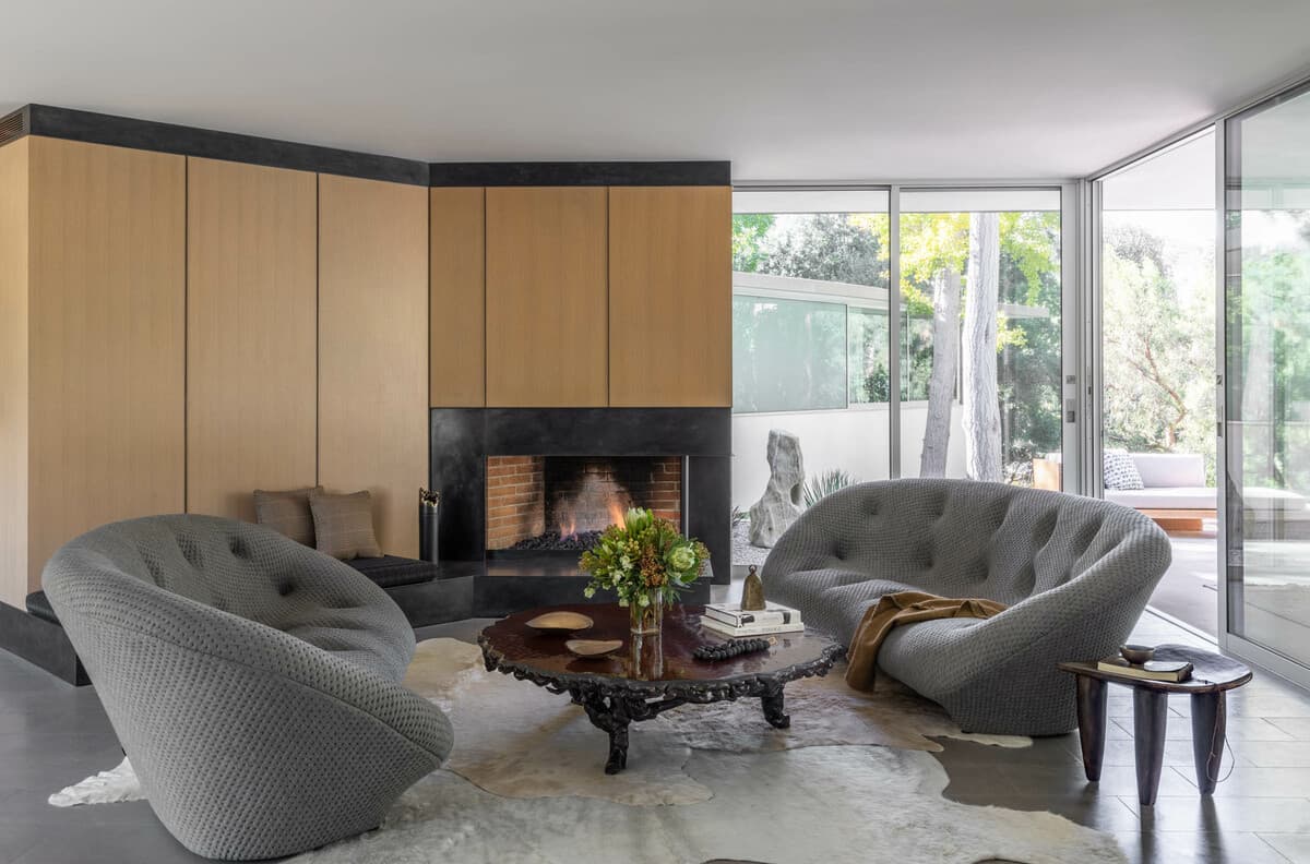 Living space with timber joinery and a hearth