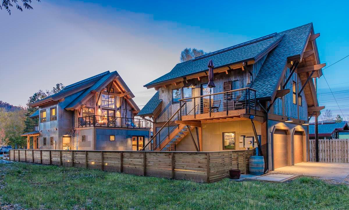 The two gabled buildings sit together within the property.