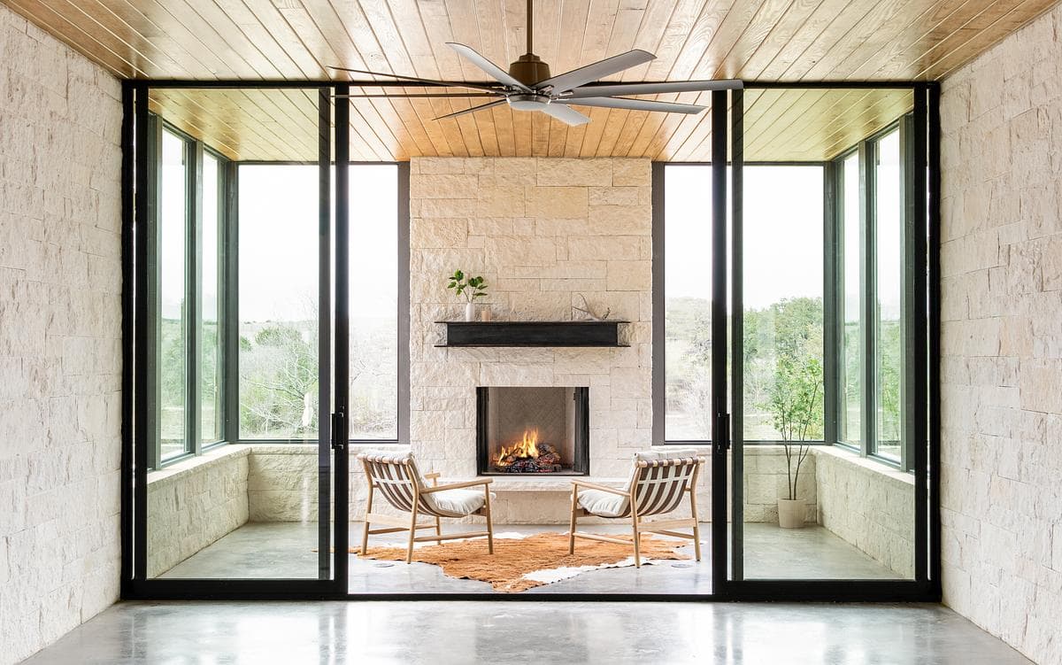 Interior opening towards a screened lakeside porch