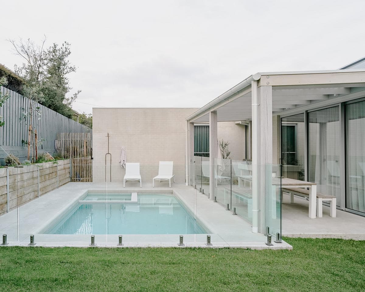 Pool and lawn beside the open living area