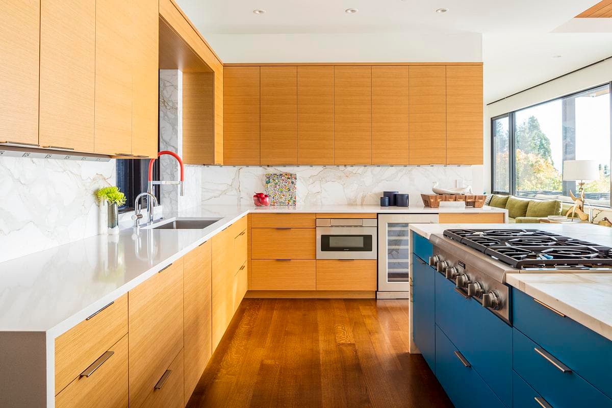 Timber cabinetry and a contrasting island in the kitchen