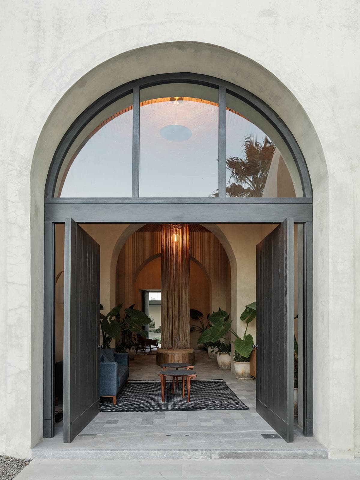 Arched entrance doors opening into the hacienda.