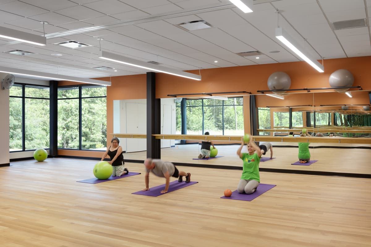 The Center at Belvedere: fitness room with daylight and garden views