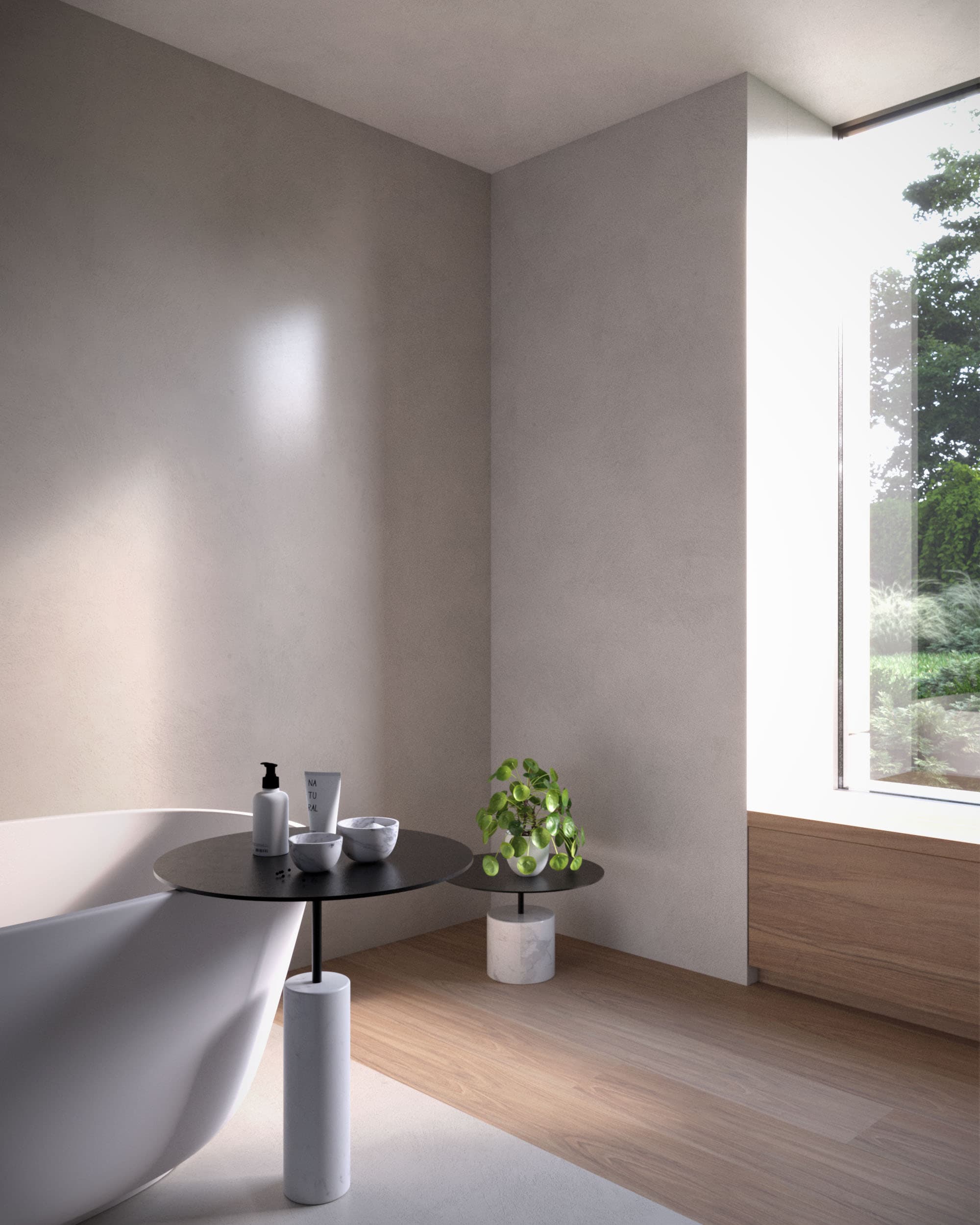 Visualisation of a bathroom with a freestanding bath and garden view