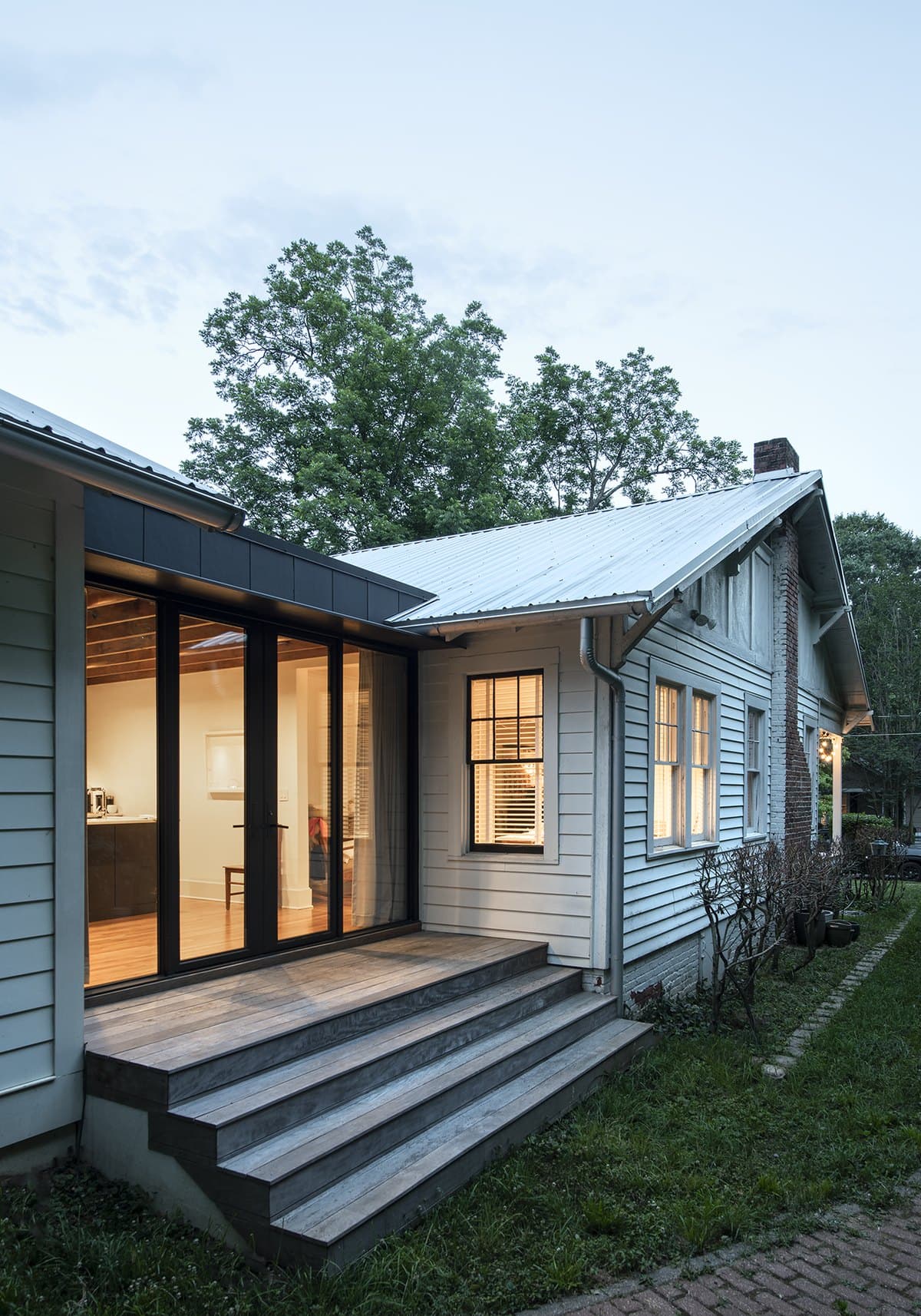 Ormewood Park Residence: bedroom wing beside the glazed kitchen
