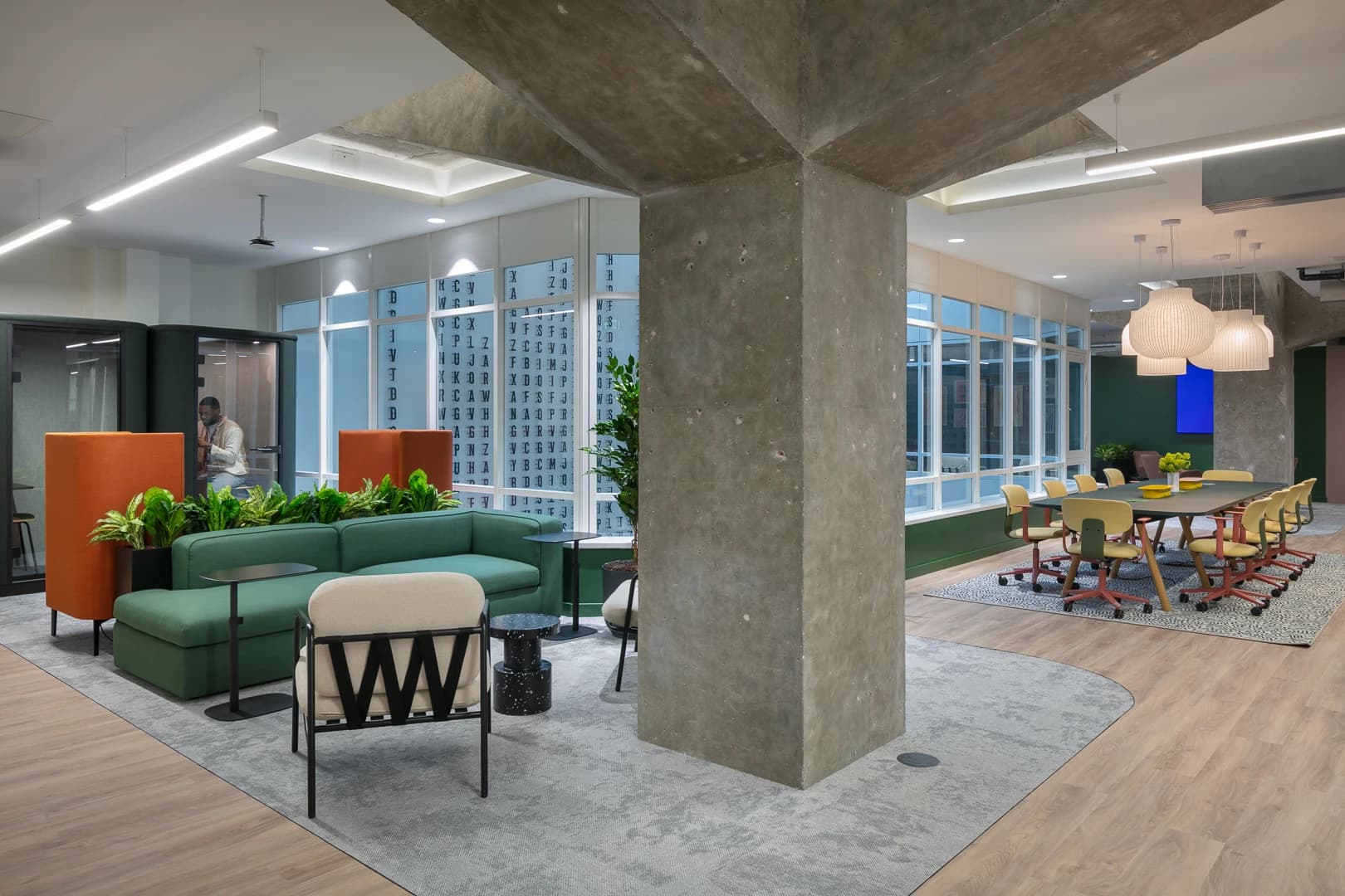 Open workplace seating and glazed meeting rooms at DF Capital