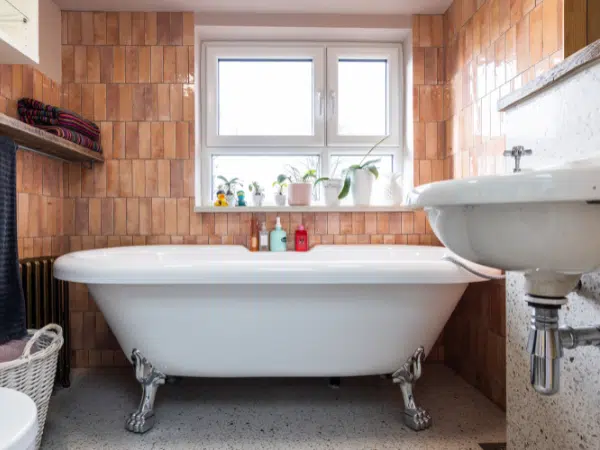 Timber-toned bathroom at Magda’s home in Stretford