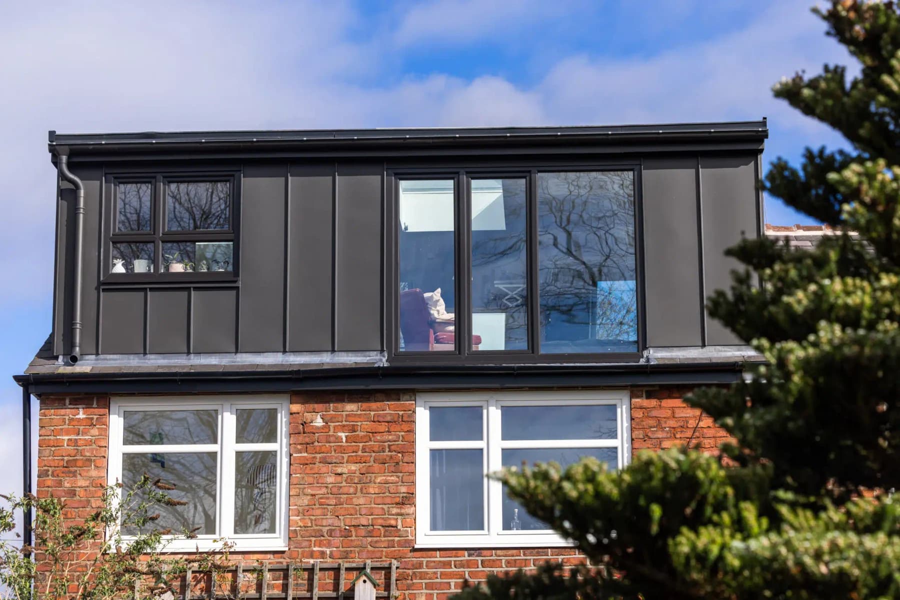 Dark-clad loft dormer at Magda’s 1930s home in Stretford
