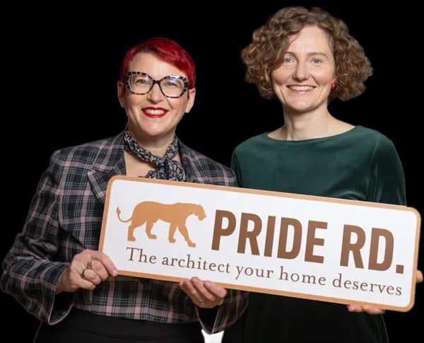 Lisa Raynes and Magda Haener with the Pride Road practice sign