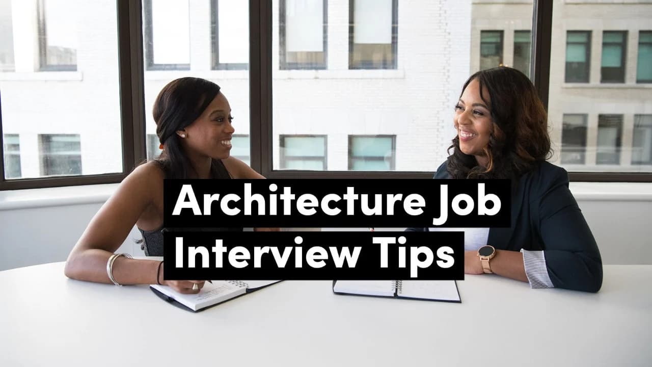 Two professionals discussing architecture job interview tips in a modern office setting.