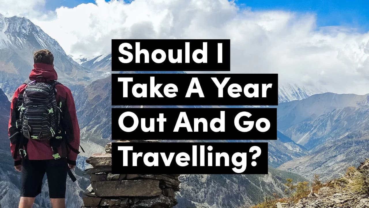 Contemplating a year out for travel amidst stunning mountain scenery.