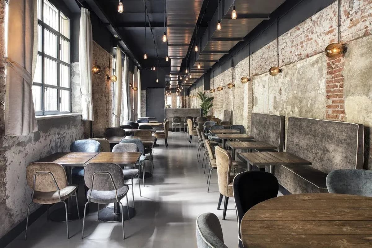 The dining room opens along the restaurant’s original brick wall.