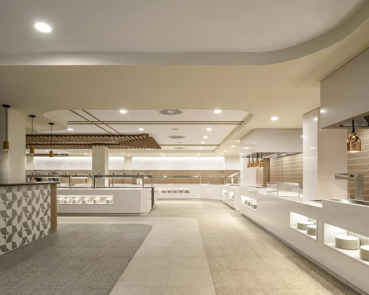 Buffet stations line a long route through the restaurant.