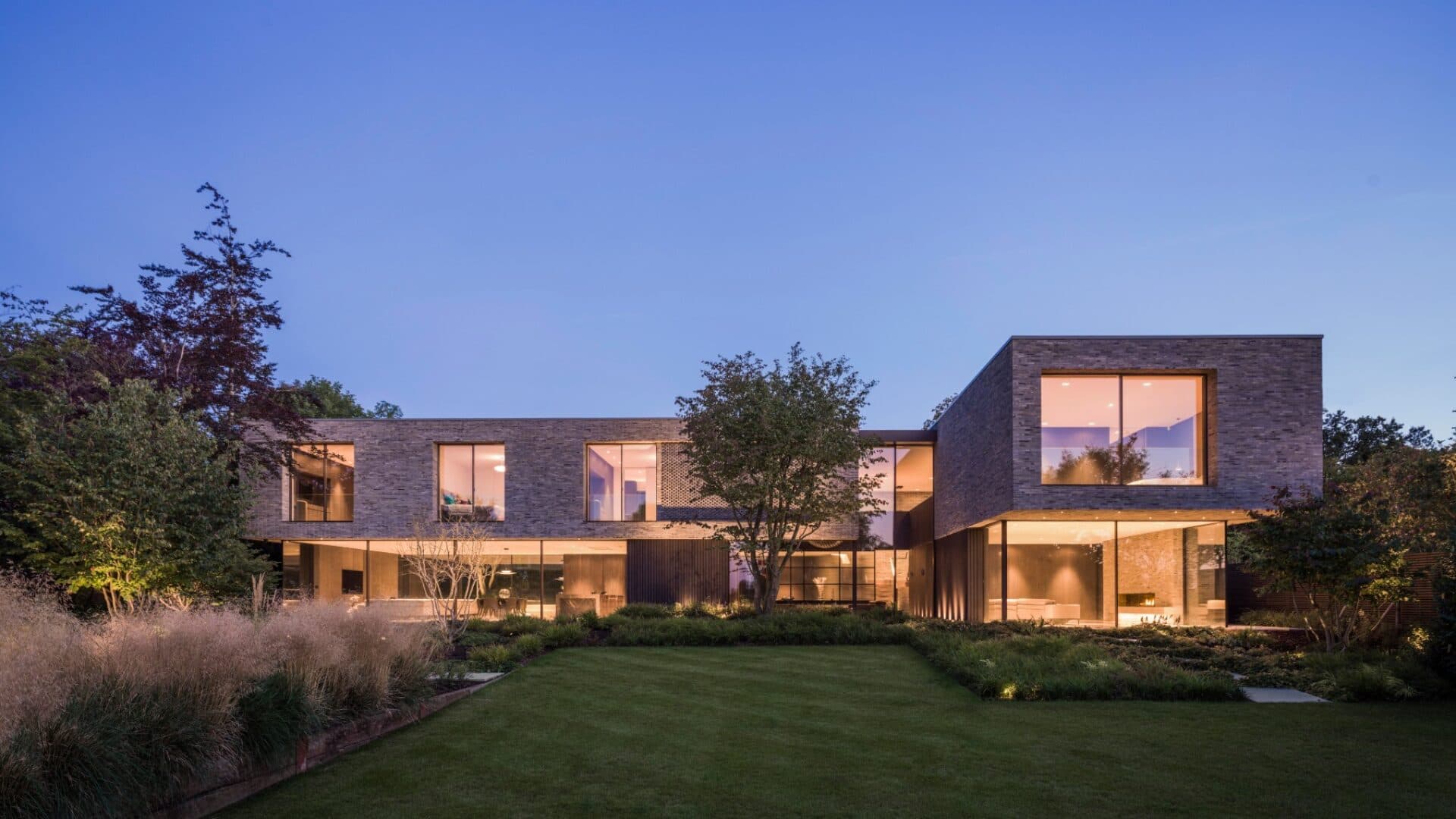 The garden elevation of Totteridge House at dusk