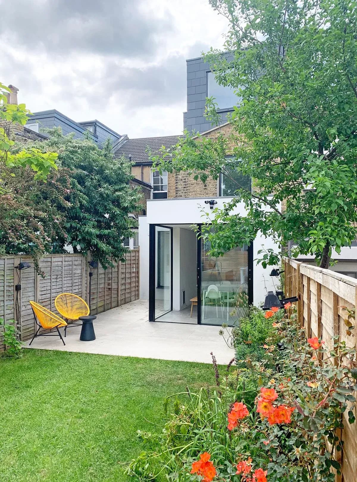 The completed rear extension and roof additions viewed from the garden.