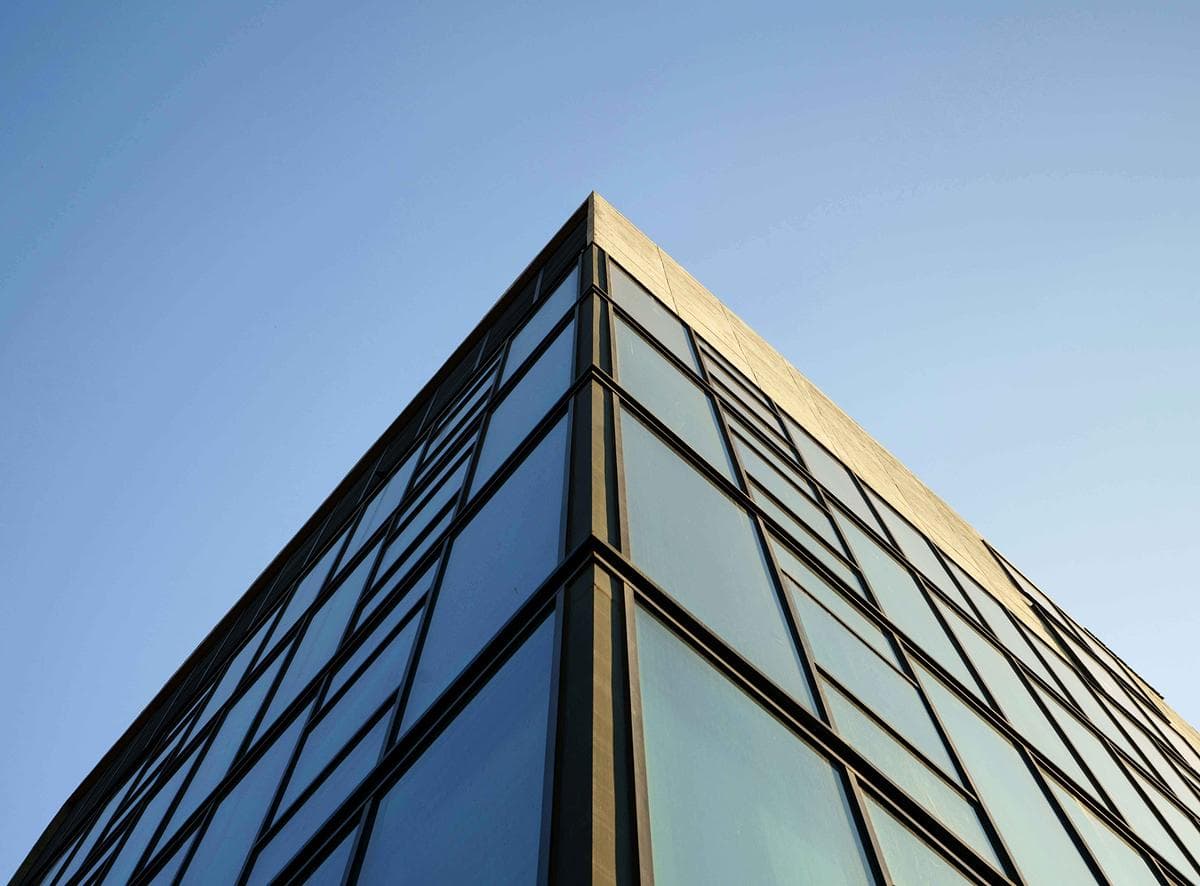 Metal framing defines the corner of the building.